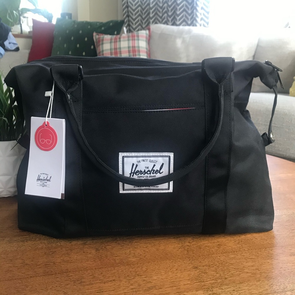 Black Herschel shoulder bag.